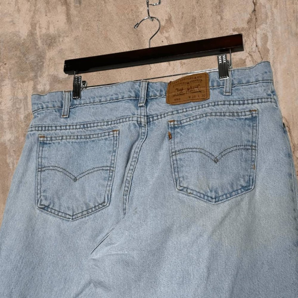 Vintage Orange Tab Levis Jeans 550 Relaxed Fit Light Wash Made in USA 90s
